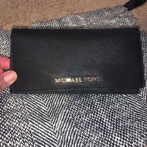 Michael Kora wallet